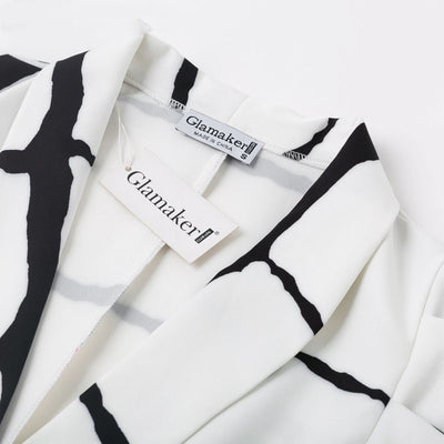 Blazer à carreaux en V profond