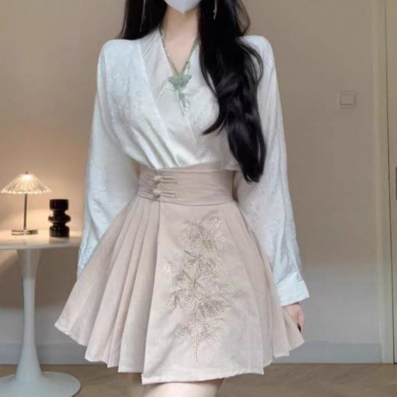 Ensemble gilet et pantalon à bretelles