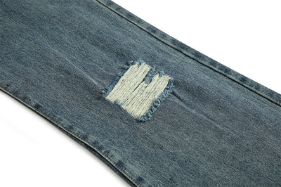 Jean bootcut déchiré