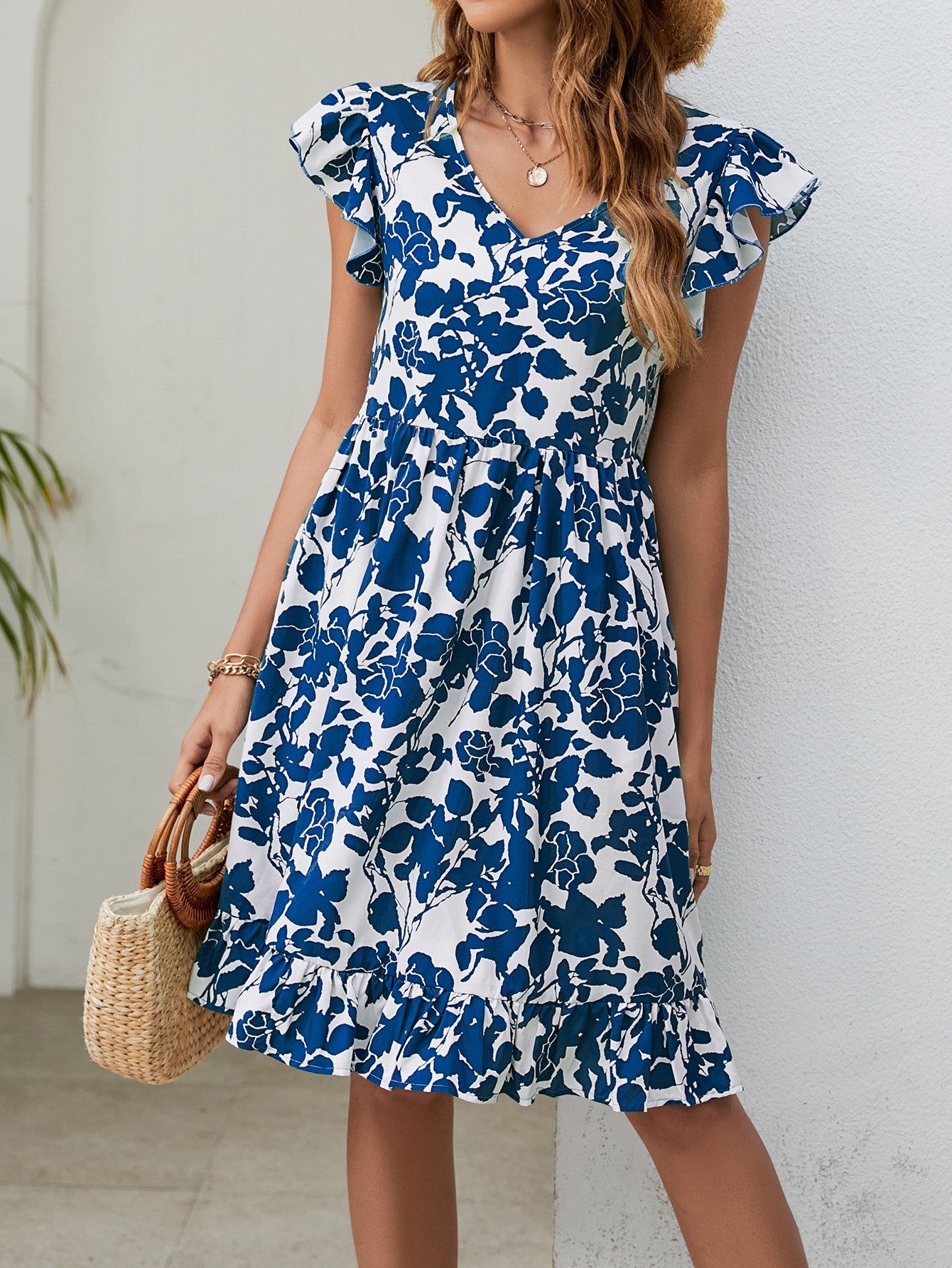 Robe à feuilles et col en V