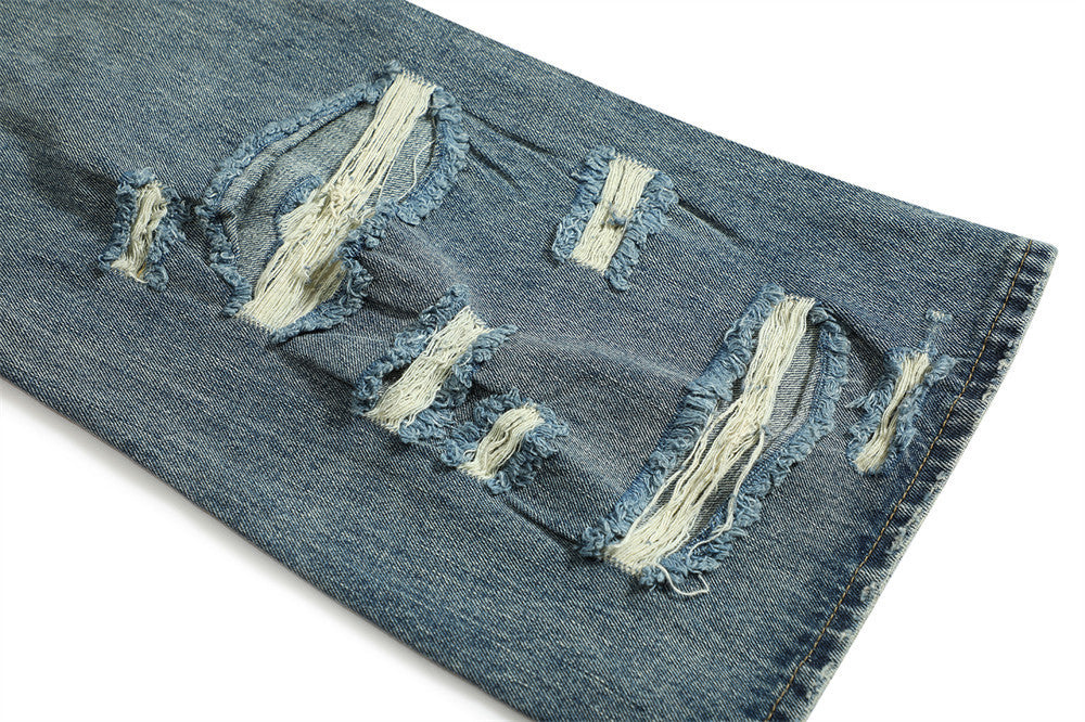 Jean bootcut déchiré