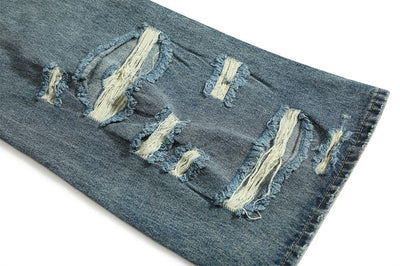 Jean bootcut déchiré