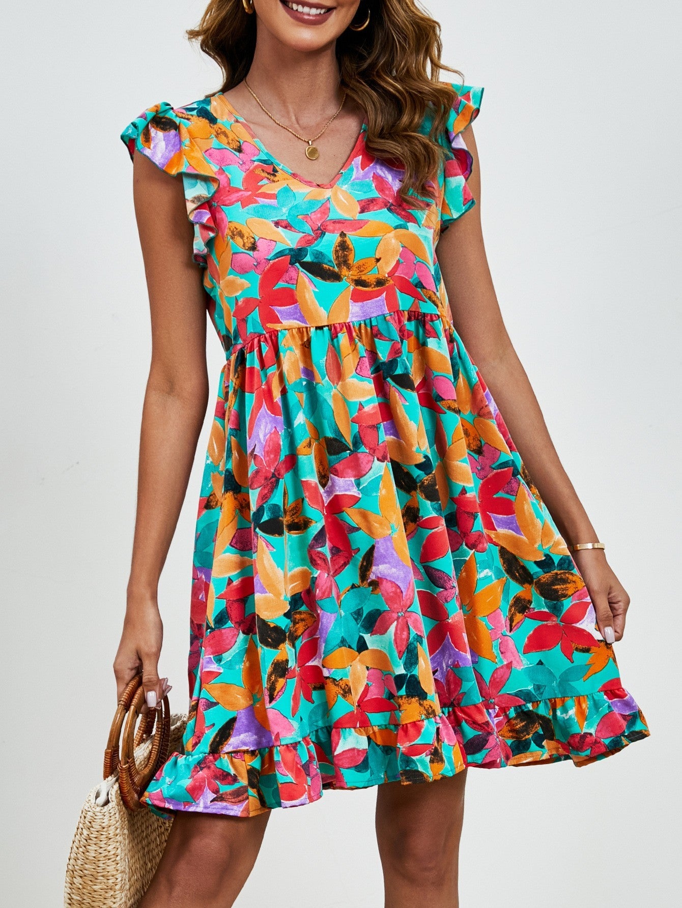 Robe à feuilles et col en V