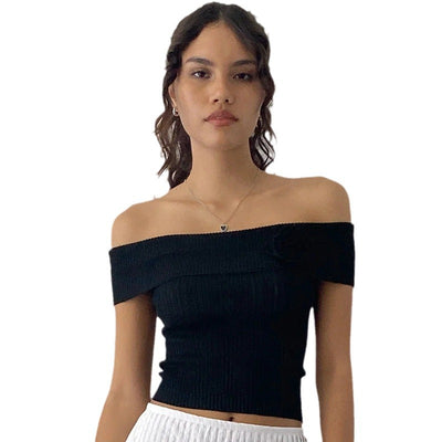 Pull fleuri à épaules dénudées