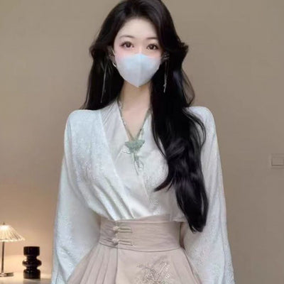 Ensemble gilet et pantalon à bretelles