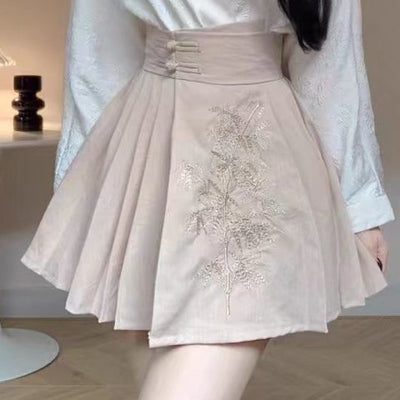 Ensemble gilet et pantalon à bretelles