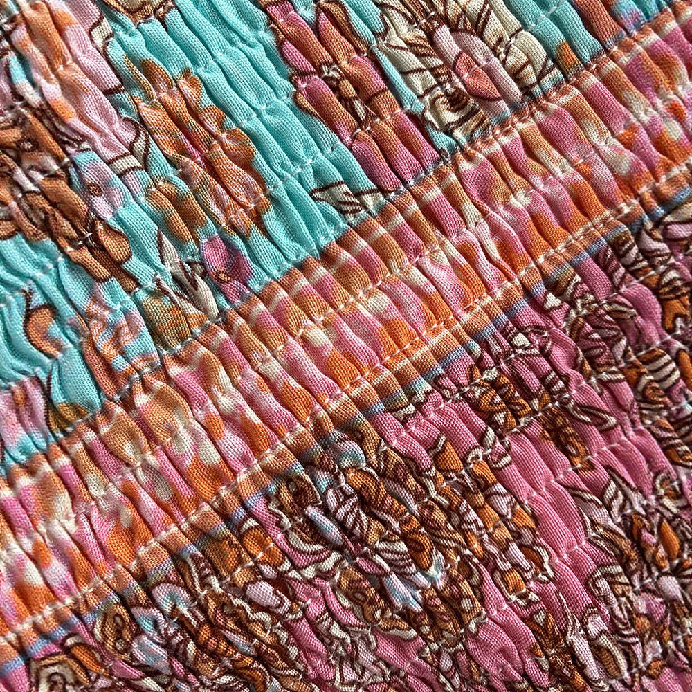Combinaison avec ceinture à poches