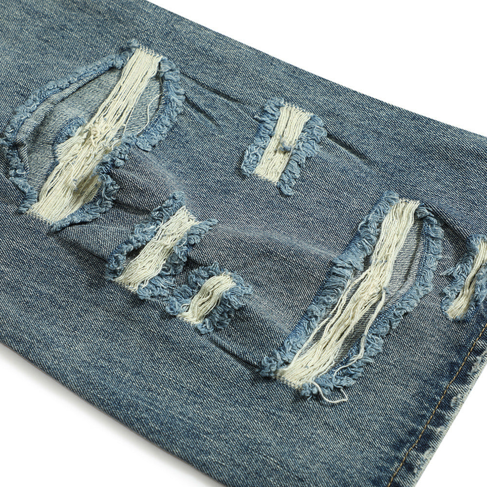 Jean bootcut déchiré