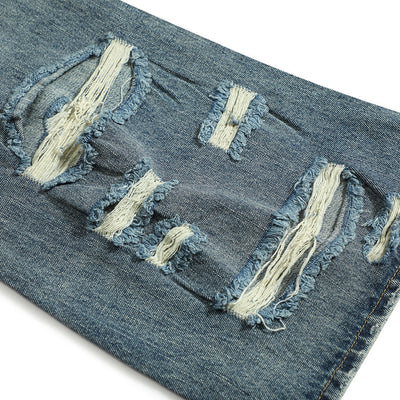 Jean bootcut déchiré